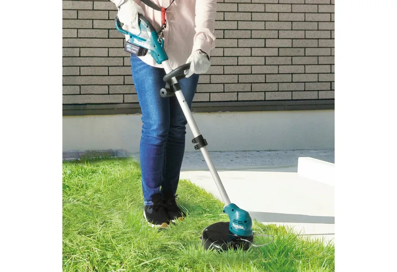 Akku-Rasentrimmer UR100DZ, 26 cm Arbeitsbreite Faden, 12V LXT, ohne Akku und Ladegerät de Makita, Bleu – image du produit 3 sur 3